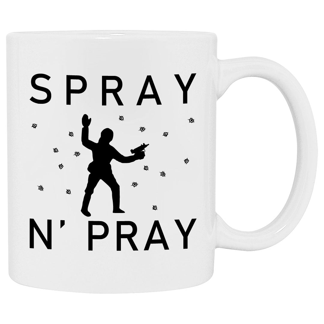 Funny gaming mug showing bullet holes around a target that says spray and pray